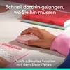 A person's hand is using a pink Logitech POP mouse and keyboard on a desk with books in the background. Náhľad obrázku produktu