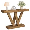 A wooden console table with decorative items on top, set against a white background. Podgląd zdjęcia produktu