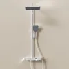 A modern shower system mounted on a plain wall. Anteprima dell’immagine prodotto