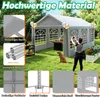 A grey party tent set up in a grassy backyard with a dog and a person taking a photo. Produktbild-Vorschau