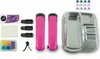 A flat lay of various crafting supplies, including pink stamping tools, a metal tray with compartments, ink pads, and small decorative elements. Produktbild-Vorschau
