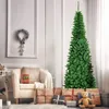 A Christmas tree and gifts are arranged in a living room setting. Voir les images du produit