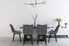 A dining room setting with four chairs around a table and a sideboard in the background. Produktbild-Vorschau
