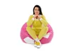 A woman sits on a beanbag chair. Produktbild-Vorschau