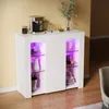 A white high-gloss sideboard with purple LED lighting, displaying various kitchenware and decorative items. Produktbild-Vorschau