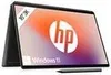 A convertible HP Spectre x360 laptop is shown in a studio setting with its screen displaying the HP logo and Windows 11. Produktbild-Vorschau
