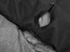 A close-up view of the zipper and fabric of a dog bed. Náhled obrázku produktu