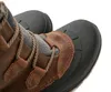 A close-up view of the top part of two brown and gray winter boots. Anteprima dell’immagine prodotto