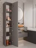 A modern bathroom with a gray tall cabinet, a sink with an orange bowl, and a bathtub. Produktbild-Vorschau