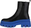 A black boot with a bright blue platform sole is shown against a white background. Produktbild-Vorschau