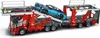 A LEGO Technic car transporter truck with a blue car on its trailer. Anteprima dell’immagine prodotto