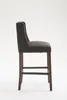 Silla de bar Cassandra, tapizada en tela, patas en madera Vista previa de la imagen del producto 3