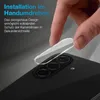 A hand is shown applying a clear camera lens protector to a smartphone. Produktbild-Vorschau