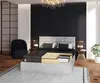 A bedroom scene with a cutaway mattress on a bed. Produktbild-Vorschau