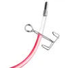 A close-up of a medical device with a red tube and a silver clamp. Produktbild-Vorschau