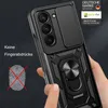 A hand is holding a black smartphone case with a ring holder and camera cover. Produktbild-Vorschau
