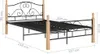 A product shot of a metal bed frame with wooden posts, showing dimensions. Produktbild-Vorschau