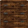 A close-up, front-facing view of a wooden dresser with three drawers, each featuring a dark metal pull handle. Náhled obrázku produktu
