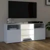 A white TV stand with a black TV on top, in a room with wooden flooring. Anteprima dell’immagine prodotto