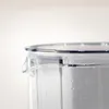 Close-up of the top of a clear pitcher with water droplets on the outside. Anteprima dell’immagine prodotto