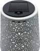 A close-up view of a solar-powered lantern with a decorative, cut-out pattern. Produktbild-Vorschau