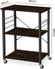 A three-tier kitchen cart with a dark wood finish and black metal frame, shown from a front-side angle with dimensions indicated. Produktbild-Vorschau