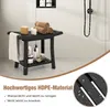 A black shower bench with towels and toiletries in a bathroom setting. Náhled obrázku produktu