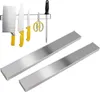 A set of magnetic knife strips and kitchen utensils including knives, scissors, and a sharpening steel, displayed against a white background. Anteprima dell’immagine prodotto