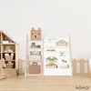 A children's bookshelf and toy storage unit in a room setting. Podgląd zdjęcia produktu