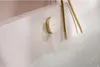 Water flowing from a showerhead into a bathtub filled with bubbles. Produktbild-Vorschau