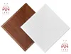 Two square wall panels, one brown and one white, are shown diagonally against a white background. Both panels have a geometric, ribbed design. Produktbild-Vorschau