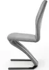 A side view of a modern gray dining chair with a z-shaped base. Produktbild-Vorschau