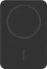 A black Belkin wireless power bank with a circular magnetic charging area and the Belkin logo. Produktbild-Vorschau