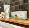 A tube and box of ApaCare Polish Medical dental polishing paste are displayed on a wooden shelf in front of a tiled wall. Voir les images du produit