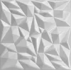A white, textured wall panel with a geometric, faceted design. Produktbild-Vorschau