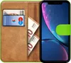 A book-style phone case for an iPhone XR, open to reveal card slots and cash. Produktbild-Vorschau