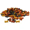 A pile of small, bone-shaped dog treats in various colors. Produktbild-Vorschau