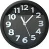 A close-up, front-facing view of a black analog alarm clock with white numbers and hands, set against a plain white background. Produktbild-Vorschau