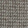 A close-up view of a carpet texture with a speckled pattern of brown and beige fibers. Náhled obrázku produktu