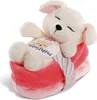 A stuffed toy puppy sleeping in a pink and red blanket. Produktbild-Vorschau