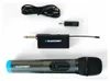 A set of wireless microphone accessories, including a microphone, receiver, adapter, and charging cable, laid out on a white background. Produktbild-Vorschau