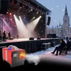 A red diesel air heater is shown in the foreground, emitting smoke, with a live band performing on a stage in the background during a snowy outdoor event. Voir les images du produit