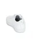 A white Puma sneaker shown from the back. Produktbild-Vorschau
