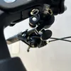Close-up view of a bicycle handlebar with a phone mount attached. Produktbild-Vorschau