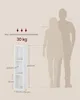 A diagram showing the dimensions of a white bookshelf next to silhouettes of two people, with text indicating weight capacity. Produktbild-Vorschau