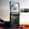 A rugged, black phone case with a kickstand is displayed on a rocky, desert-like terrain. Produktbild-Vorschau