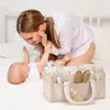 Dámská taška na přebalování s uchy, 1 kus, pohodlná Náhled obrázku produktu 3