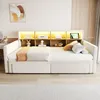 A daybed with a headboard featuring shelves and integrated lighting, decorated with small items. Anteprima dell’immagine prodotto