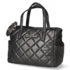 A black quilted Valentino handbag is shown against a white background. Náhľad obrázku produktu