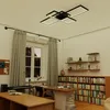 A modern office or study room with a desk, keyboard, bookshelves, and a ceiling light. Voir les images du produit